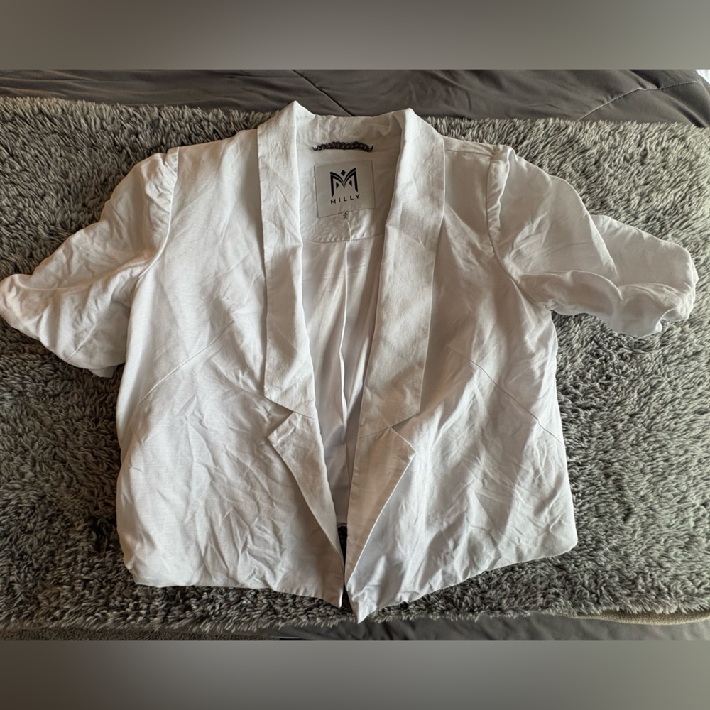 Milly short sleeved open jacket with puff sleeves.